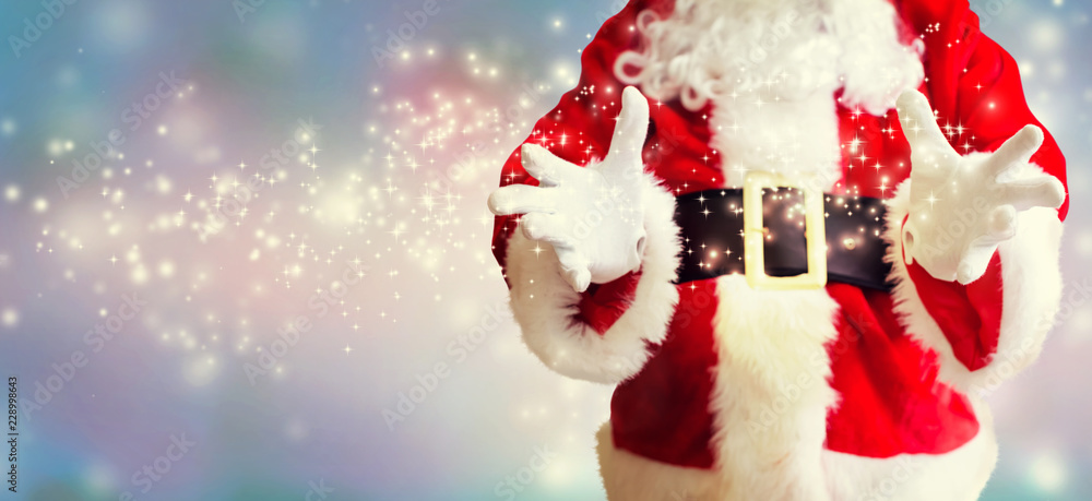 Santa with holding gesture on a shiny light background