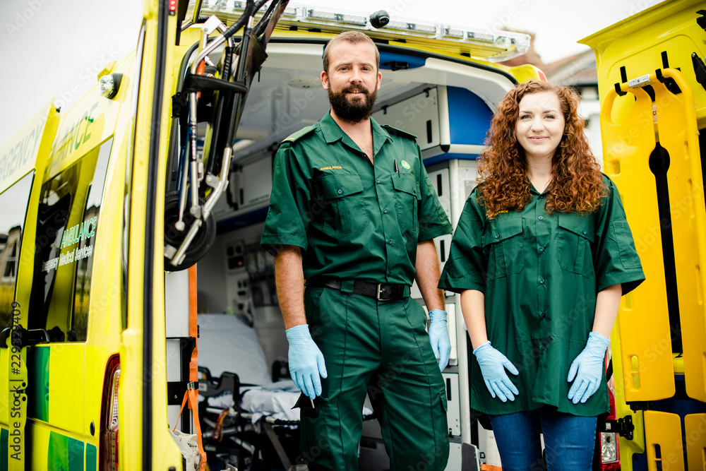 Paramedics at work with an ambulance