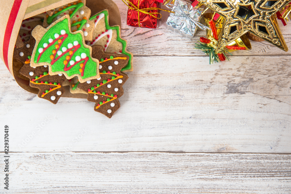 Beautiful Christmas composition and decoration with baked Christmas gingerbread cookie in paper bag 