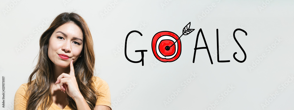 Goals with target with young woman in a thoughtful fac