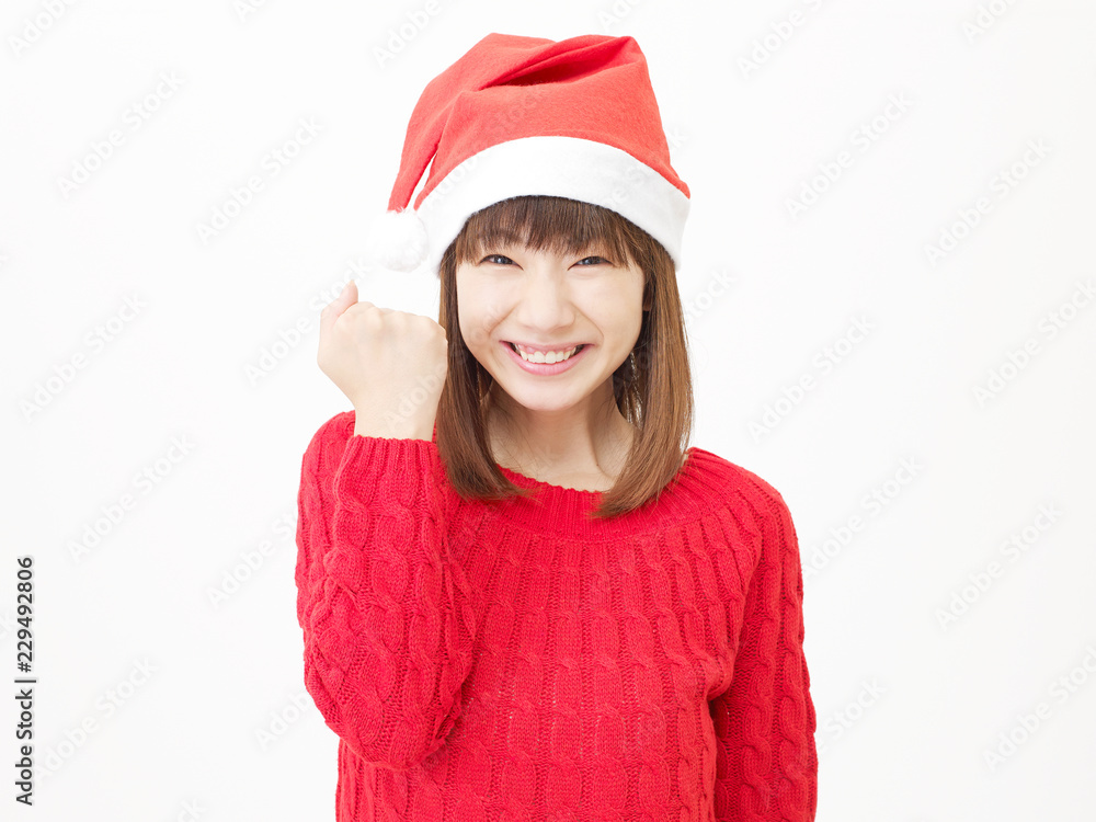 女性　クリスマス　ガッツポーズ