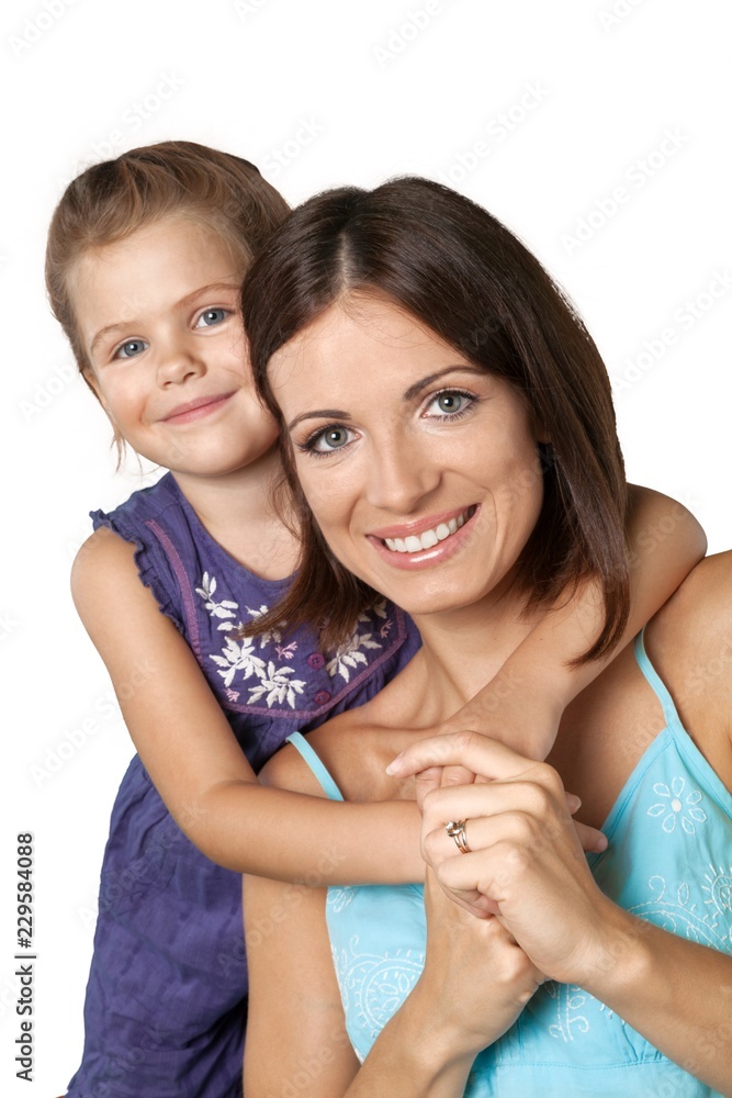 Mother and Young Daughter Hugging