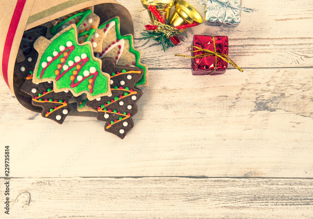 Beautiful Christmas composition and decoration with baked Christmas gingerbread cookies in paper bag