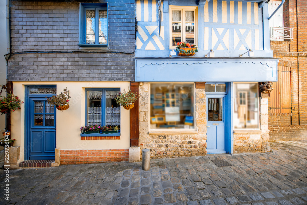 Street view with ancient wooden buildings in Honfleur, famous french town in Normandy