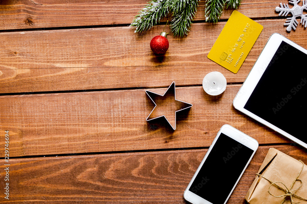 Online shopping for new year on wooden table top view