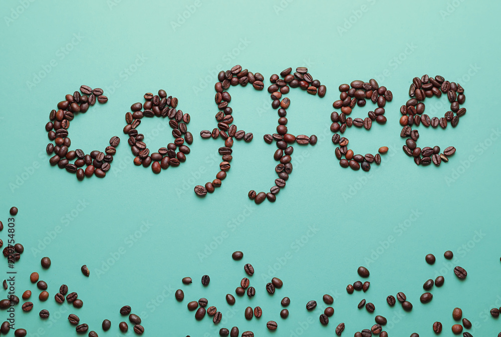 Word coffee made of beans on color background