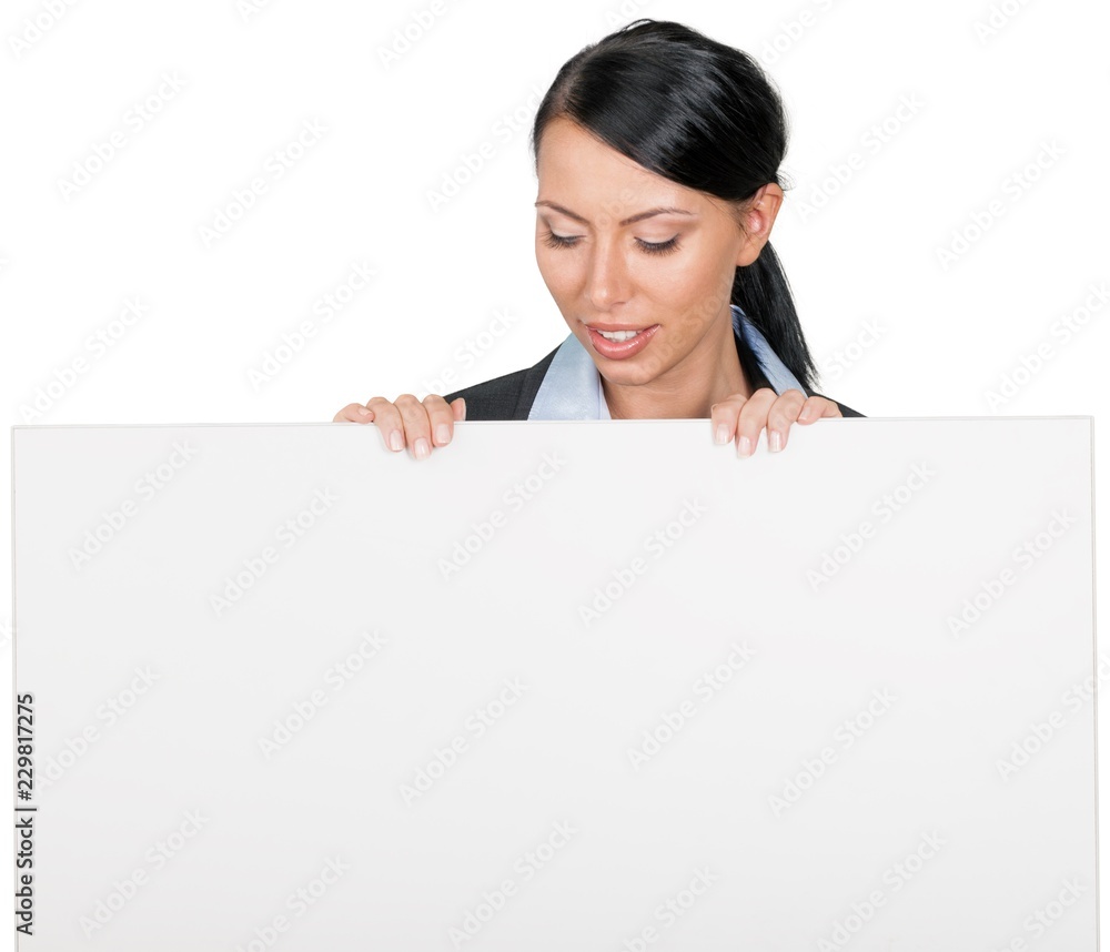 Businesswoman holding a blank sign