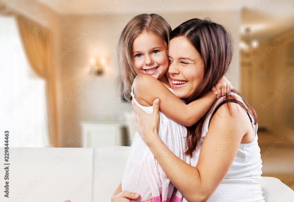 Happy Mother and daughter hugging