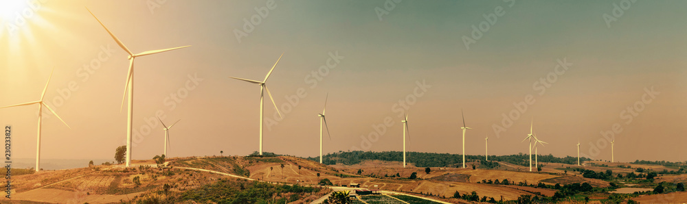 wind turbine on hill with sunlight. concept eco power energy in nature