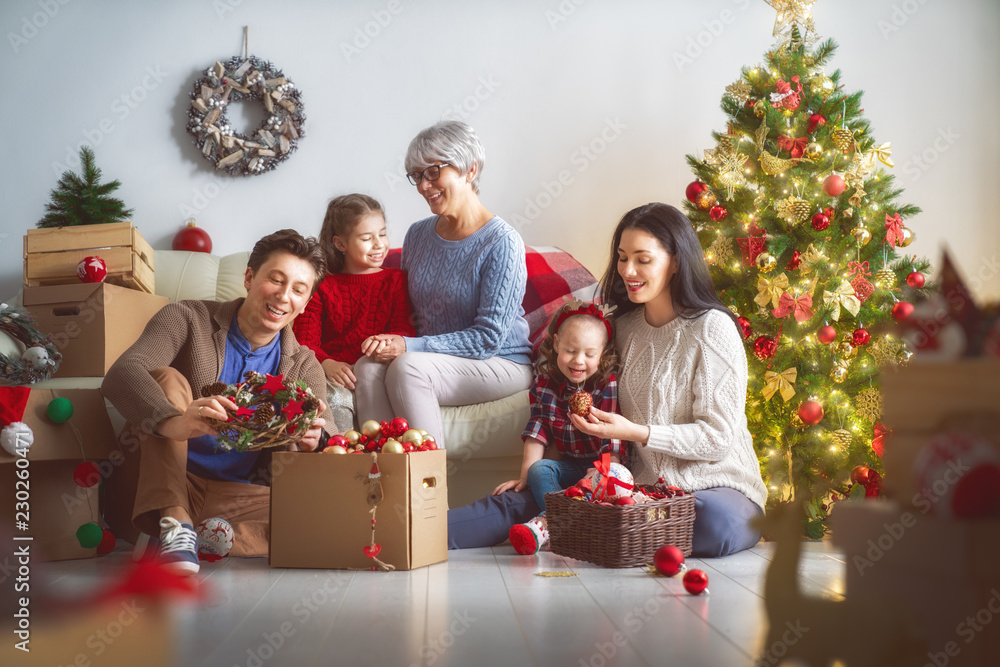 family preparing for Christmas