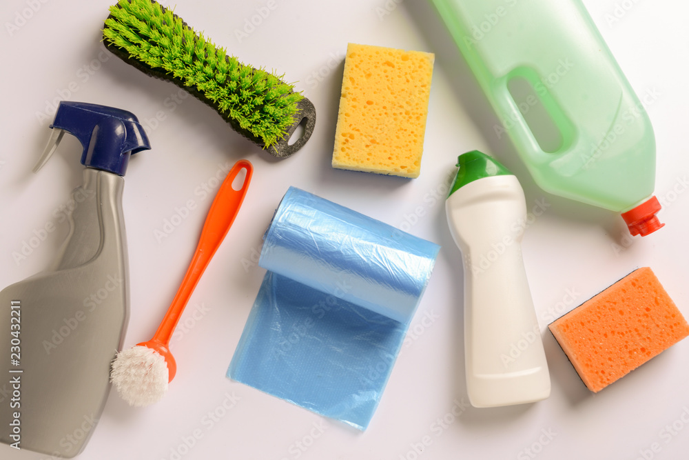 Cleaning supplies on white background