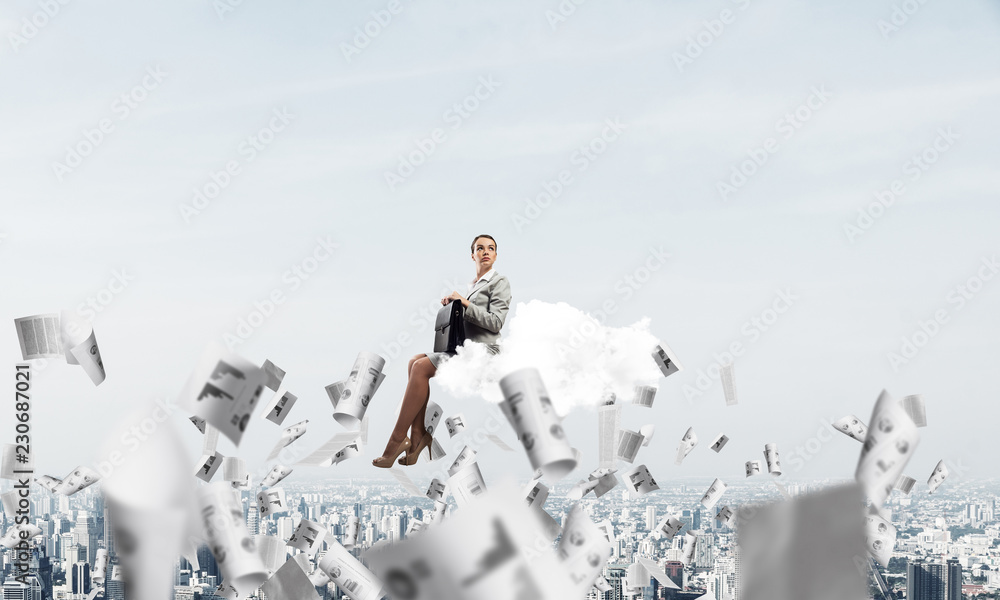 Woman float above city on cloud and papers flying around