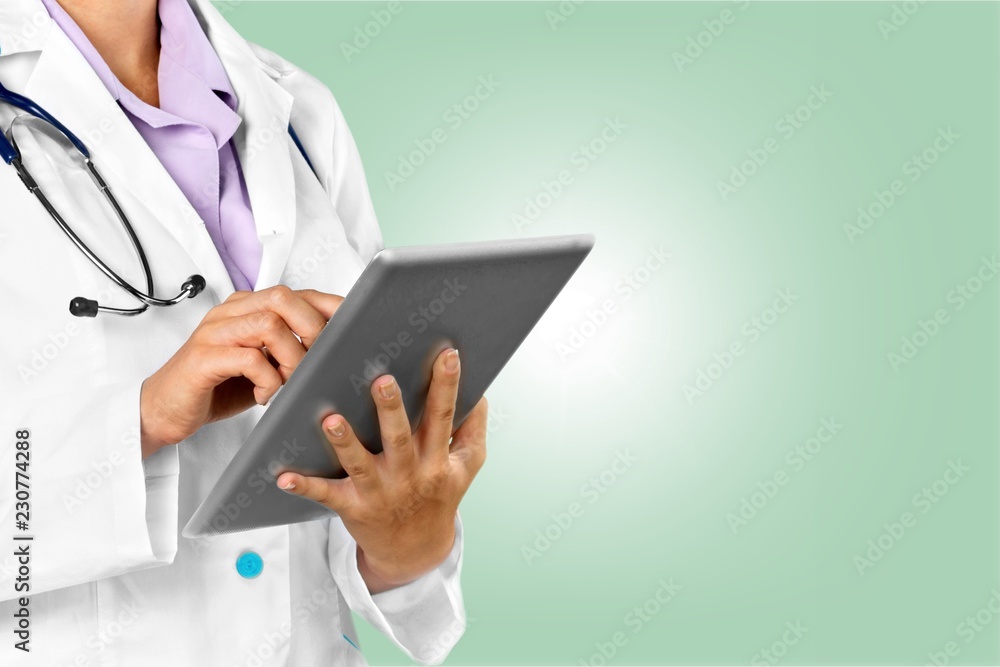 Close-up Doctor at hospital working with tablet