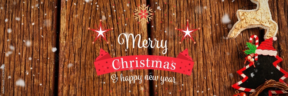 Merry Christmas message on wood background