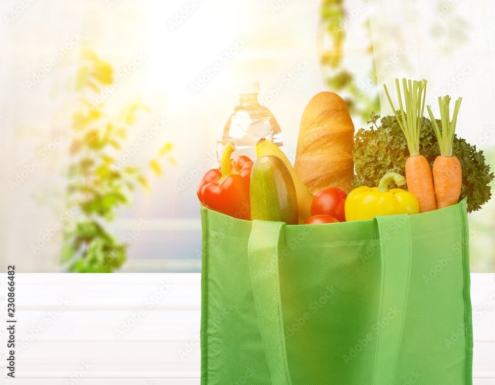 Full shopping  bag, isolated over  background