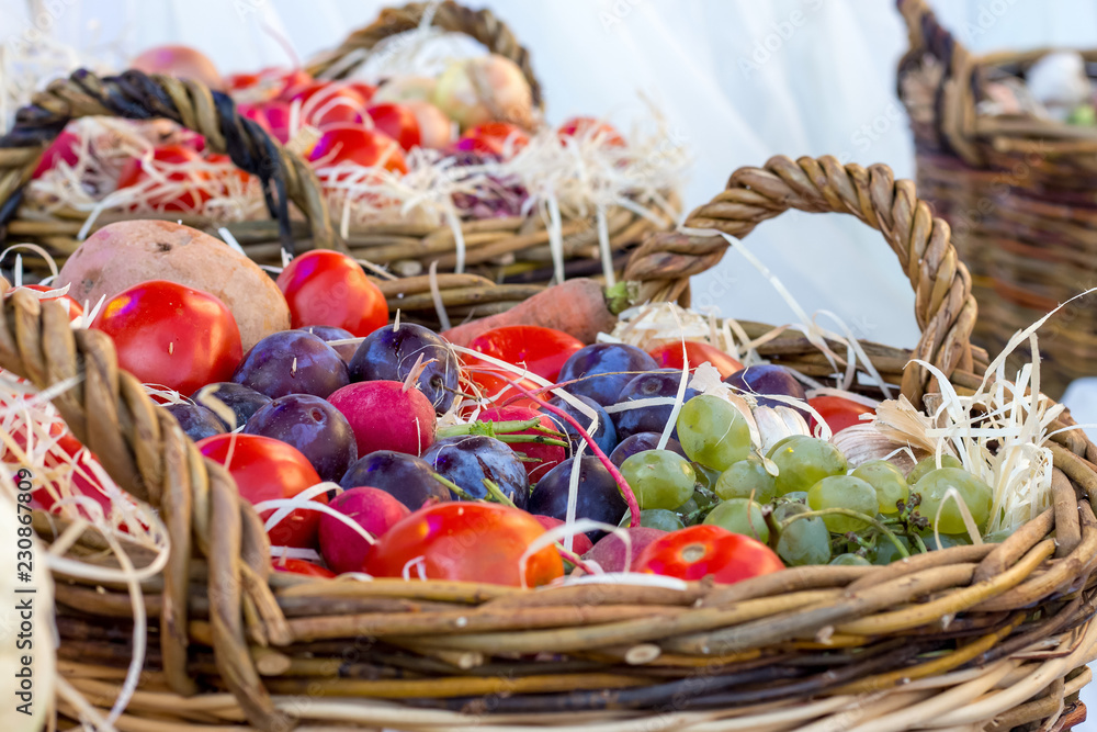 Vegetables, fruits and berries in a basket on Thanksgiving_