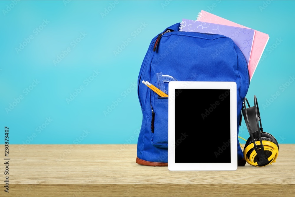 School Backpack with stationery, close-up view