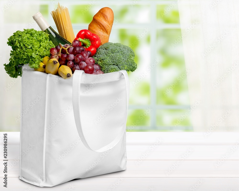 Full shopping  bag, isolated over  background