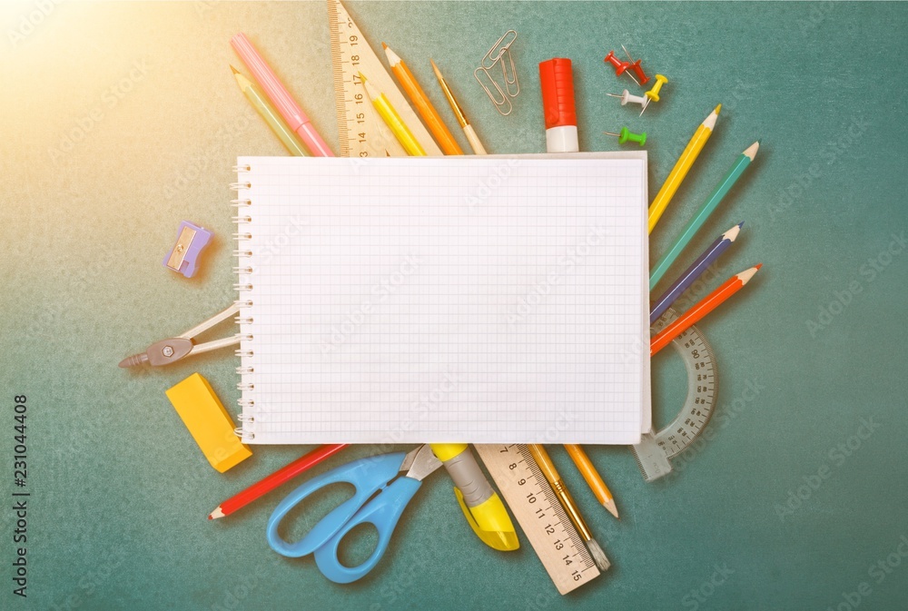 Assortment  of School supplies on  background