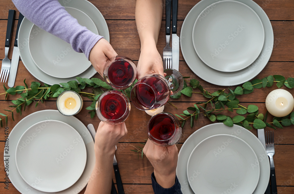 Friends drinking wine in restaurant