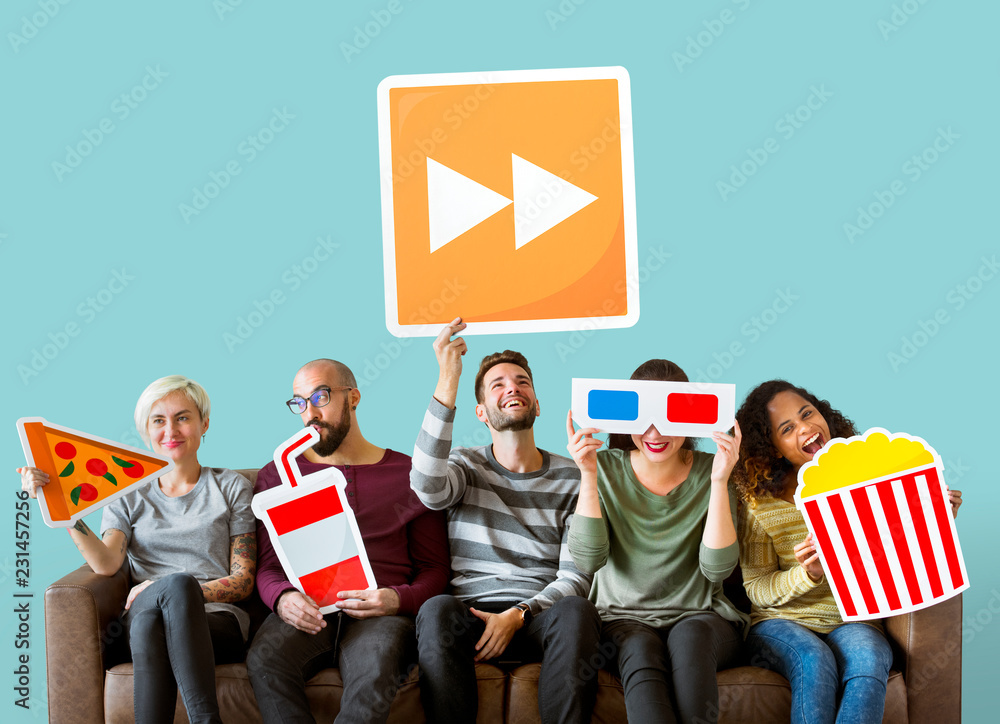 Group of diverse friends holding movie emoticons