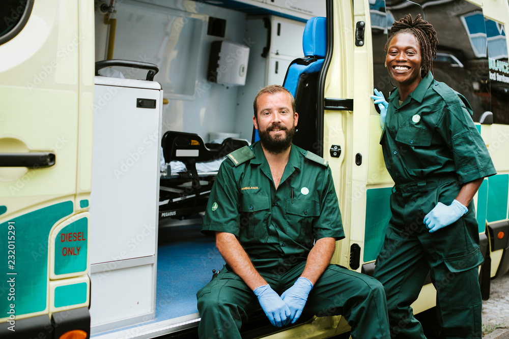 Paramedics team with an ambulance