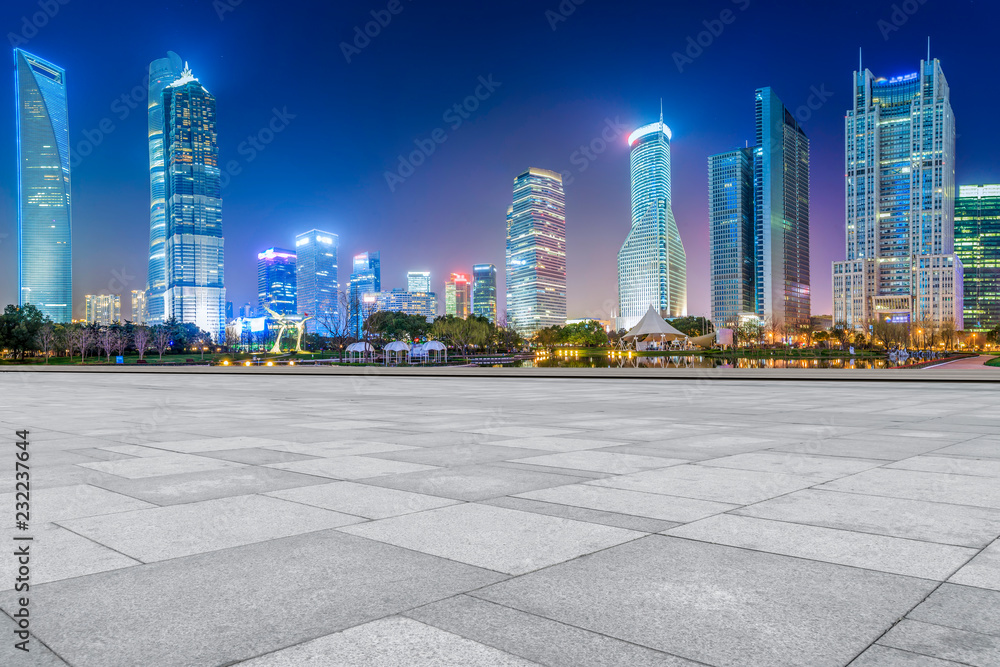 Blue sky, empty marble floor and skyline of Shanghai urban architecture.