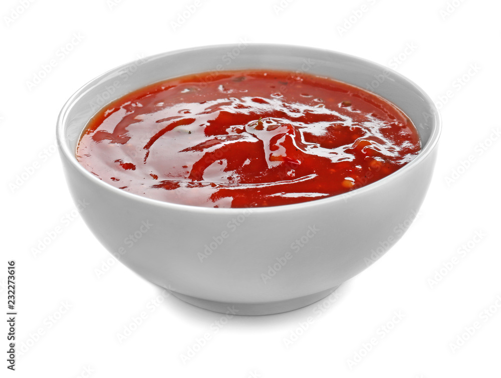 Tasty tomato sauce in bowl on white background