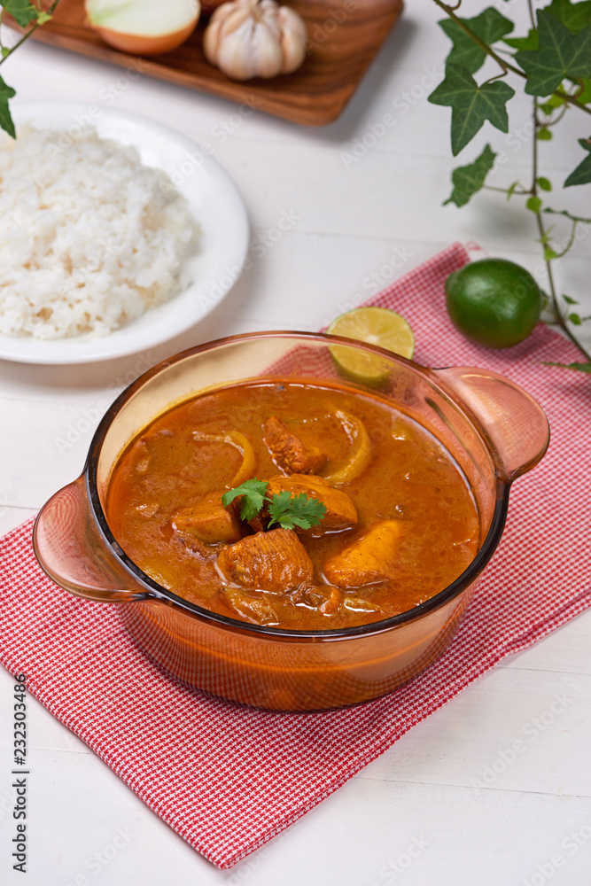 Homemade delicious chicken curry with coconut milk and spies