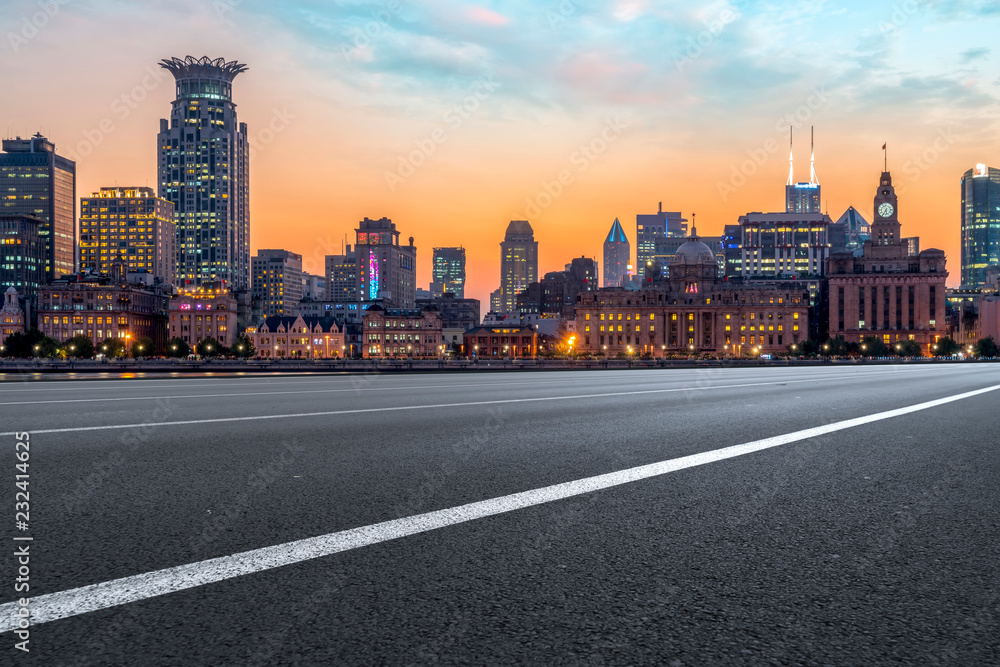 City skyscrapers and road asphalt pavement