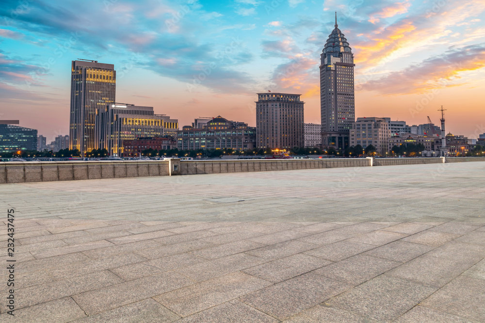 City skyscrapers and square slate ground