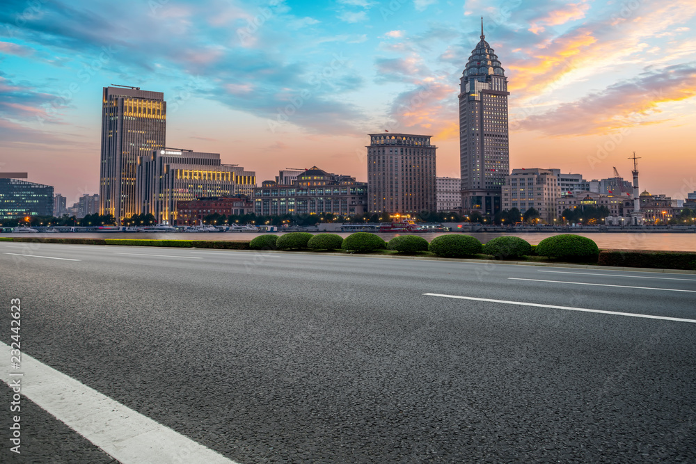 City skyscrapers and road asphalt pavement