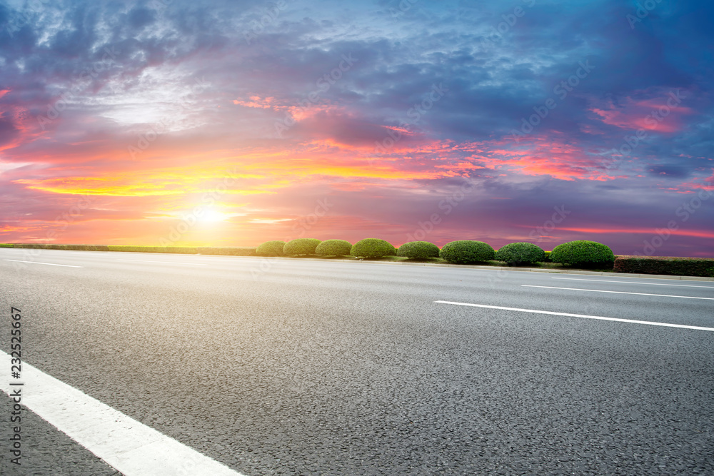 Empty highway asphalt pavement and sky cloud landscape..