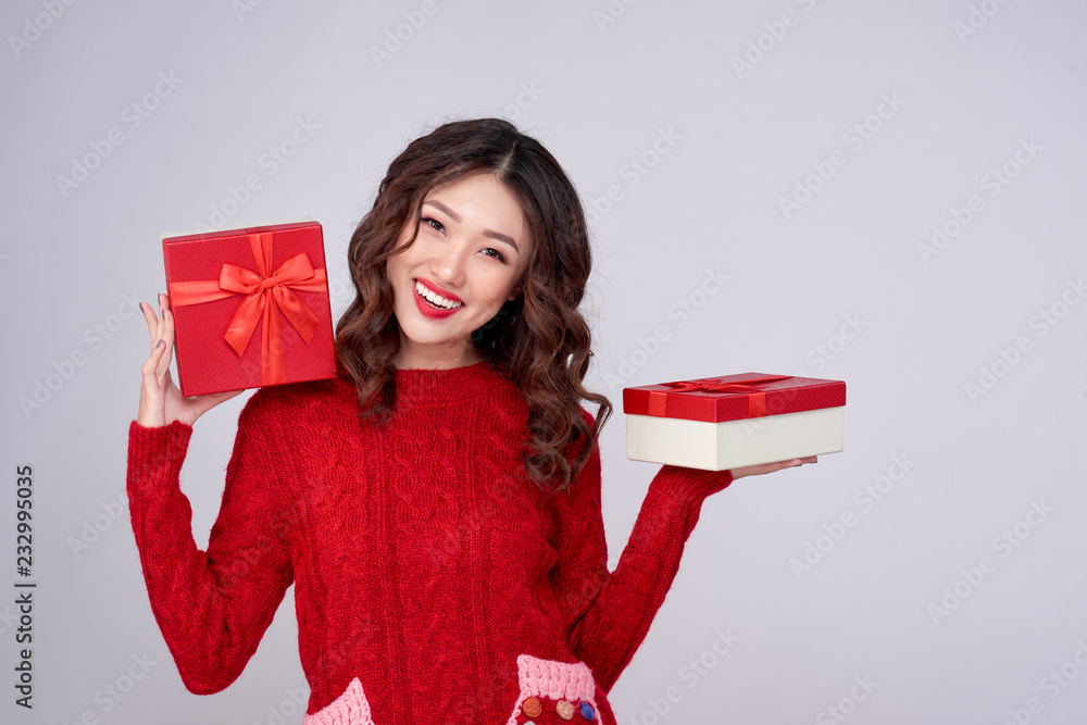 Beautiful asian woman portrait hold gift in christmas style