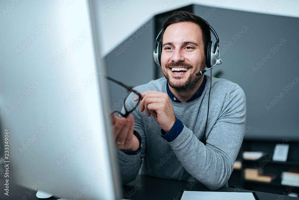 Close-up image of customer service representative at work.