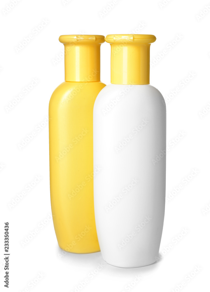 Plastic bottles of baby cosmetic products on white background