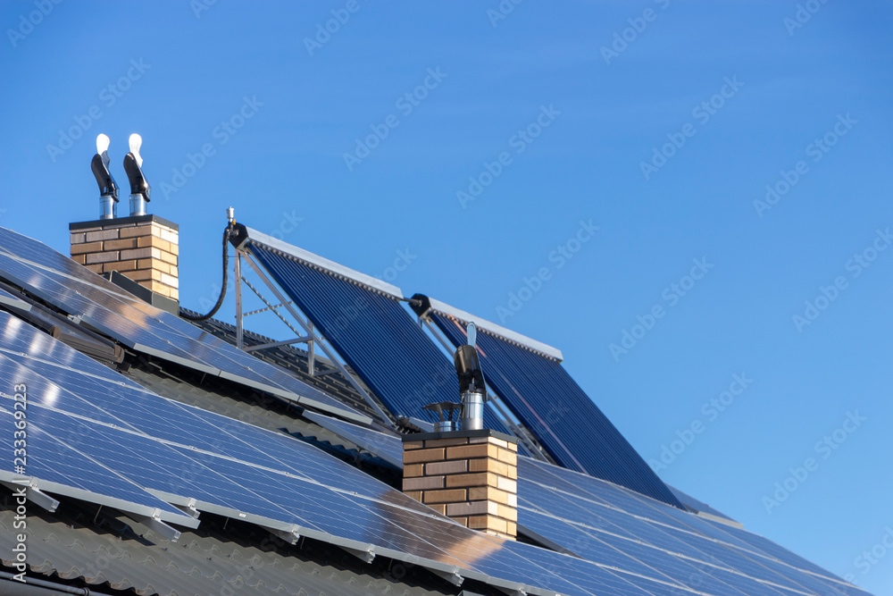 Solar installation for the generation of green electricity and water heating on the roof of a reside