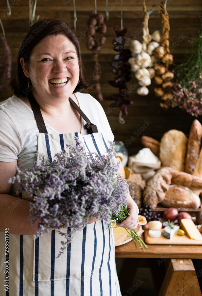 Florist holding a bouquet of caspia flowers