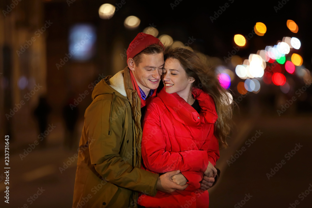 Loving young couple on romantic date in evening