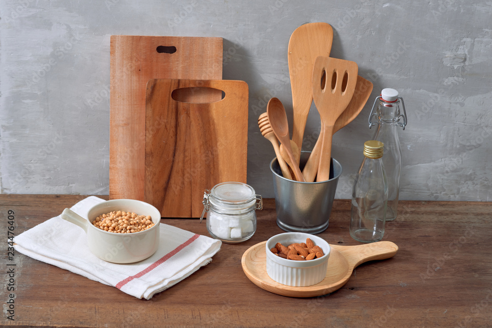 Kitchen still life with nuts and utensils