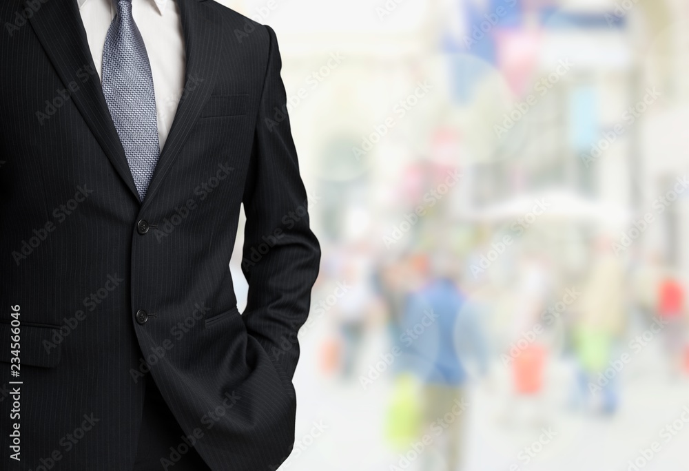 Confident business man wearing elegant suit