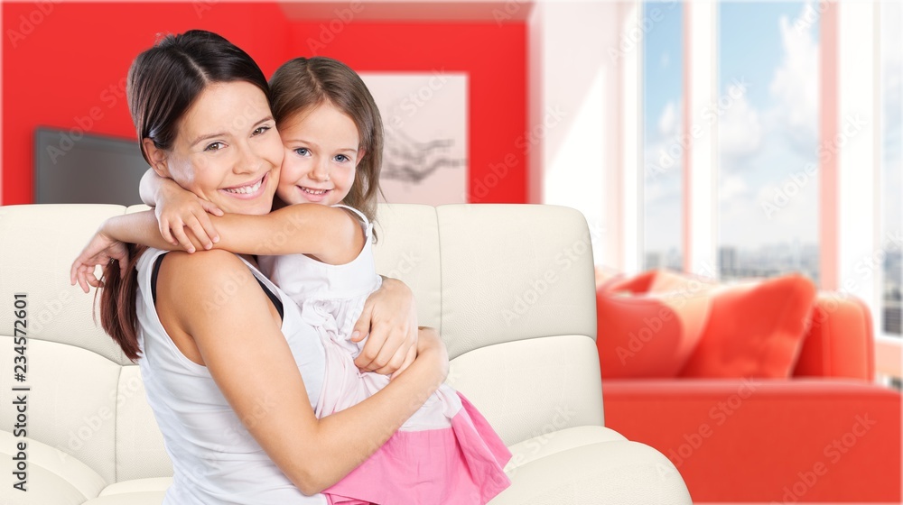 Happy Mother and daughter hugging