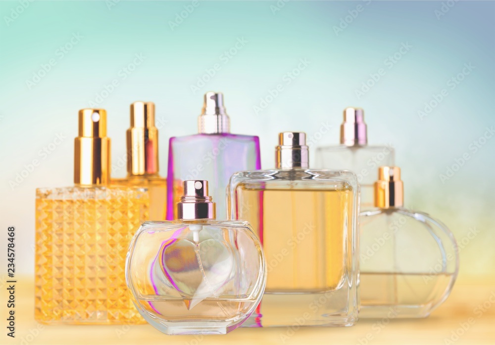 Aromatic Perfume bottles on background