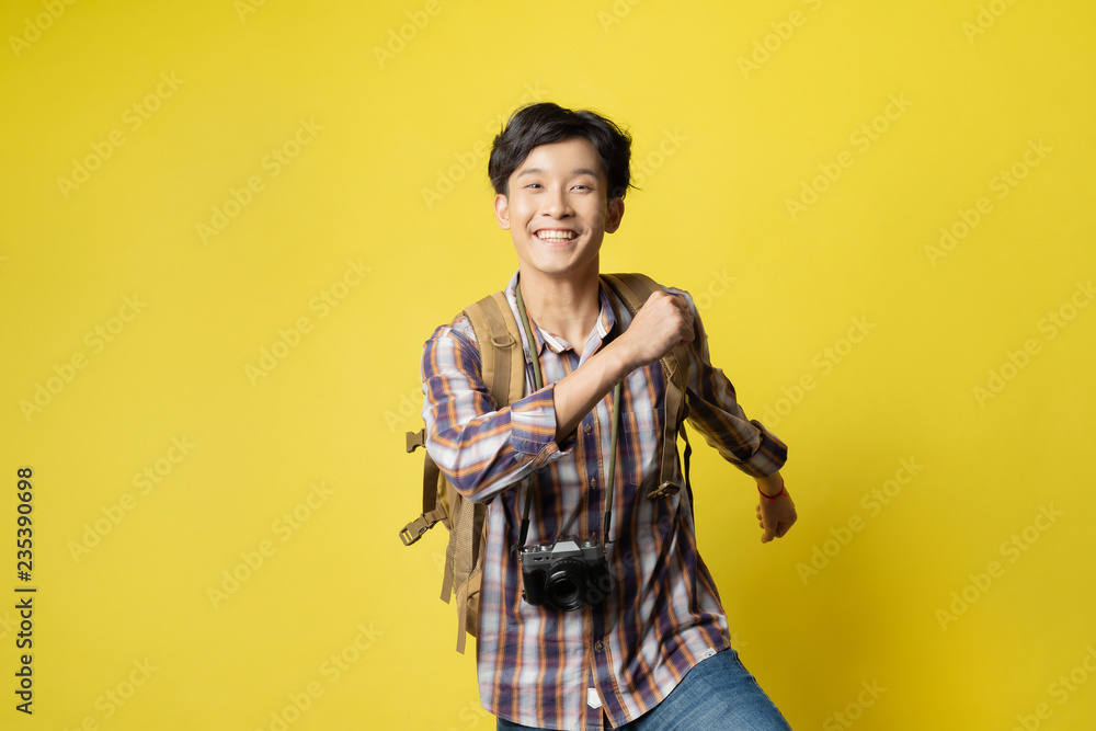 Asian guy looks handsome a tourist, he was smiling.He is fun