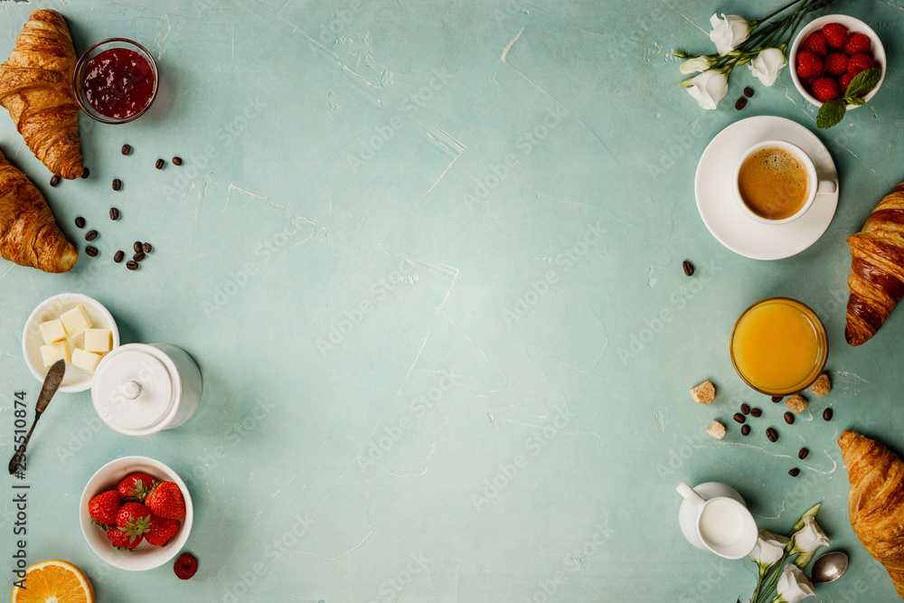 Continental breakfast captured from above - space for text