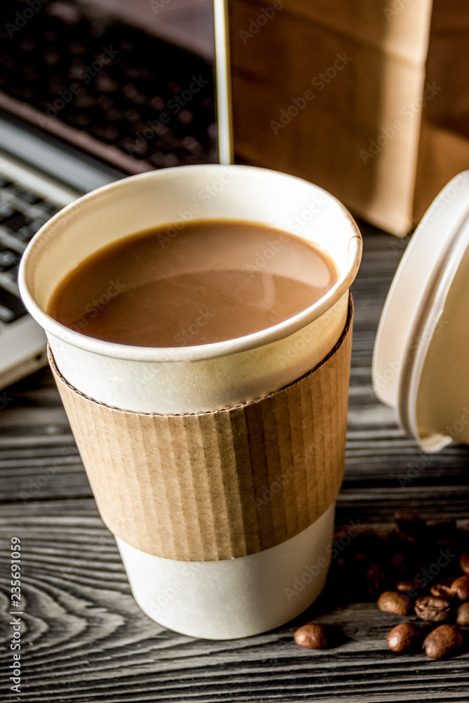 coffee cup take away at wooden background