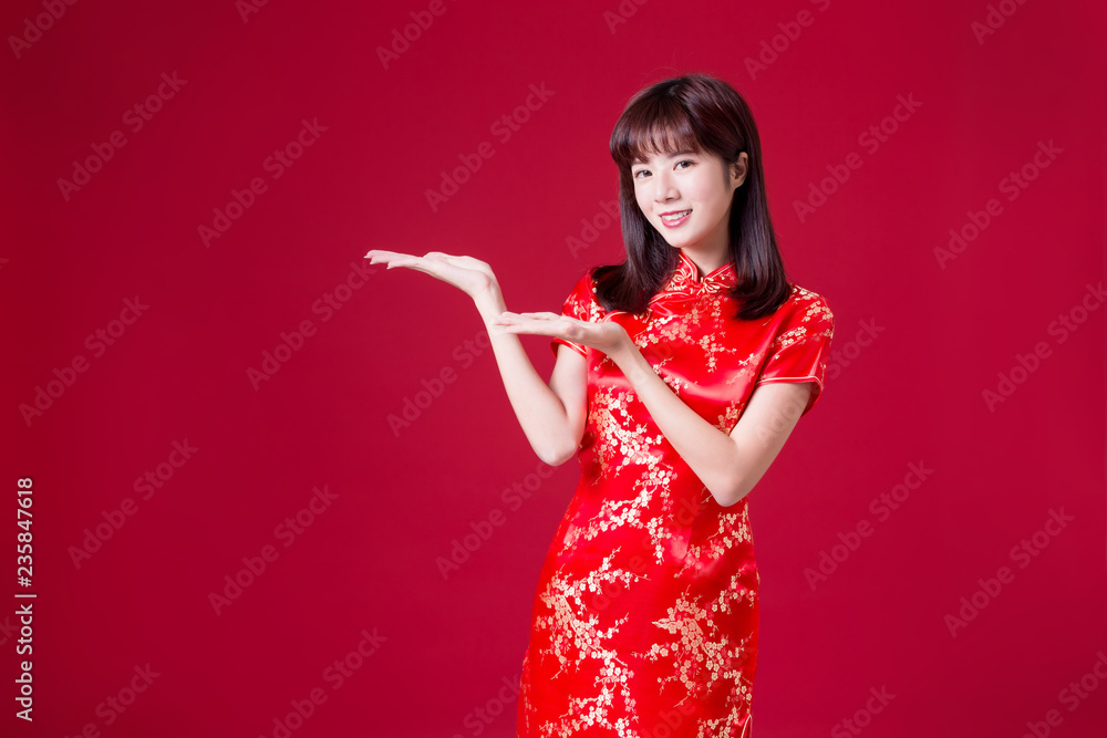 woman show something with cheongsam