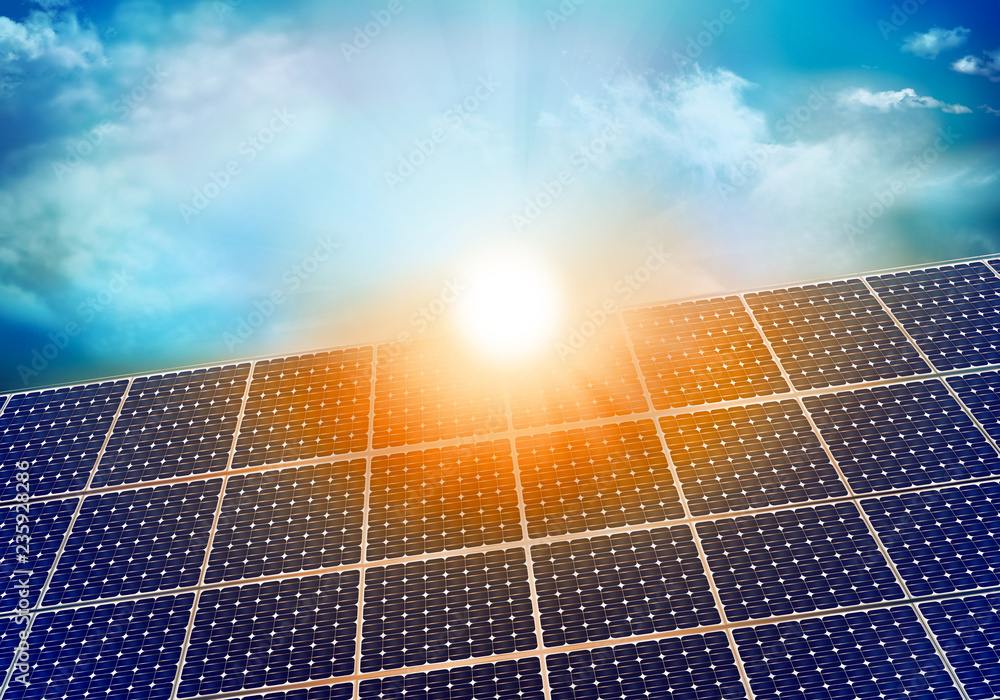 Solar photovoltaic panel with sun reflection at sunset. Background with sky and clouds