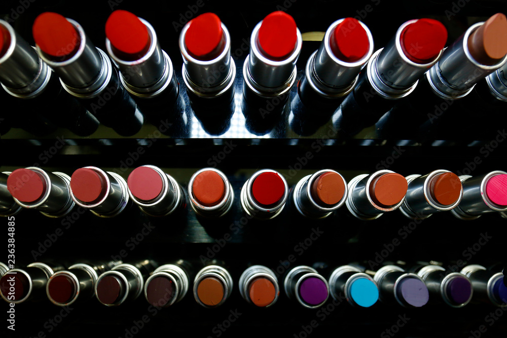 Rack of range of pink lipsticks 