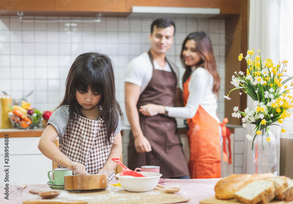 Happy Asian family cooking in kitchen, with happy and smile, lifestyle happy family concept